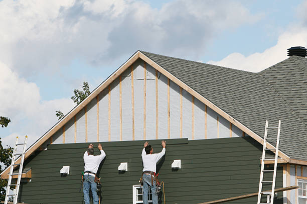 Professional Siding Contractor technician working in Greenville, IN